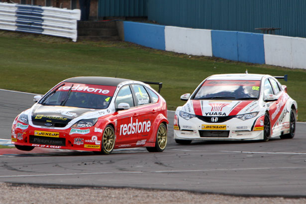 Mat Jackson being chased by Gordon Shedden for the lead