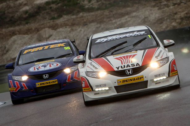 Matt Neal and Jeff Smith in their Honda Civics during the 1st free practice session