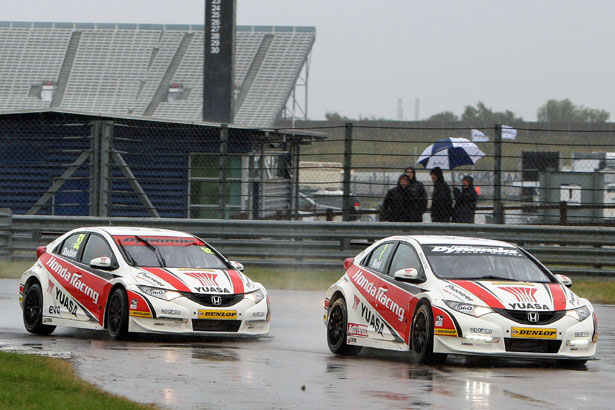 Matt Neal briefly leads Gordon Shedden for a championship point