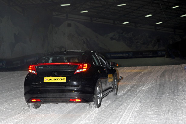 A Honda Civic climbs the Tamworth Snowdome ski slope