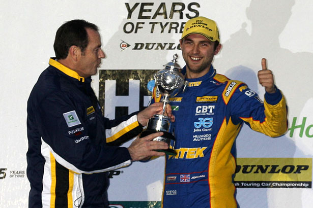 Andrew Jordan receiving his trophy from BTCC Series Director Alan Gow