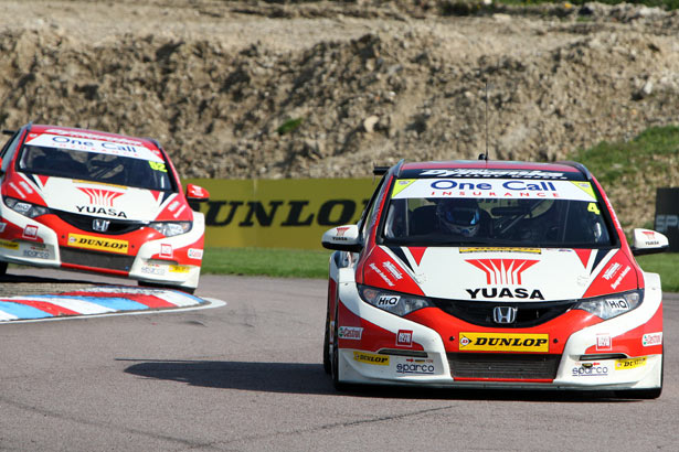 Matt Neal being followed by Gordon Shedden