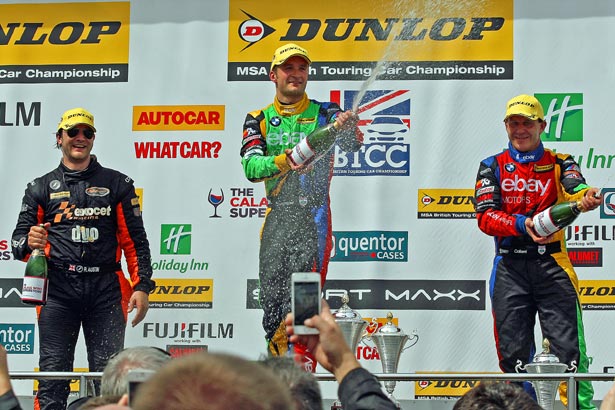 Colin Turkington on the podium with Rob Collard and Rob Austin