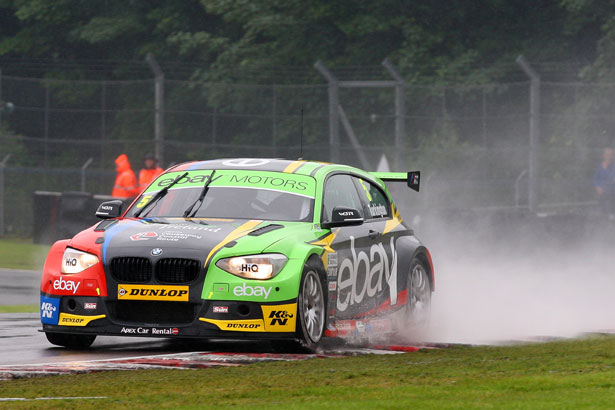 Colin Turkington exploring the wet conditions at Oulton Park