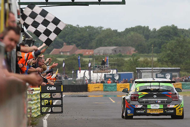 Colin Turkington takes the chequered flag again at Croft