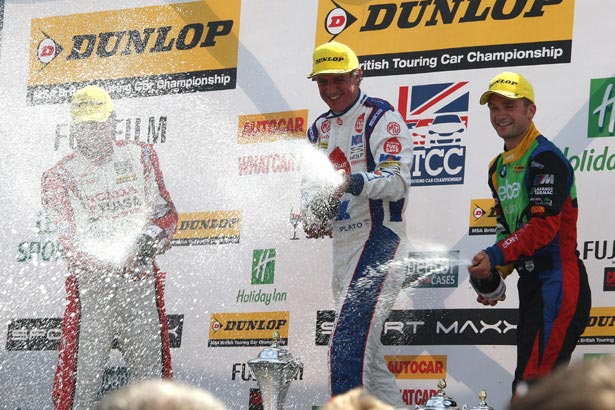 Jason Plato on the podium with Colin Turkington (right) and Matt Neal (left)