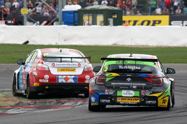 Colin Turkington challenging Jason Plato for the lead