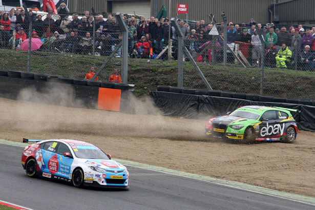 Colin Turkington is punted off the track by Jason Plato