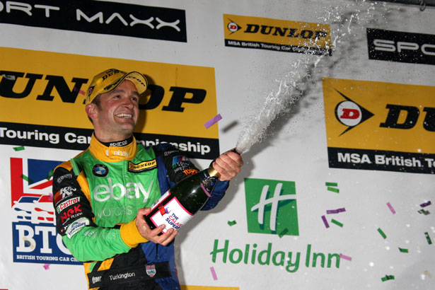Colin Turkington sprays the victory champagne
