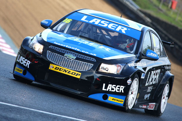 At the wheel of the Laser Tools Racing Chevrolet Cruze
