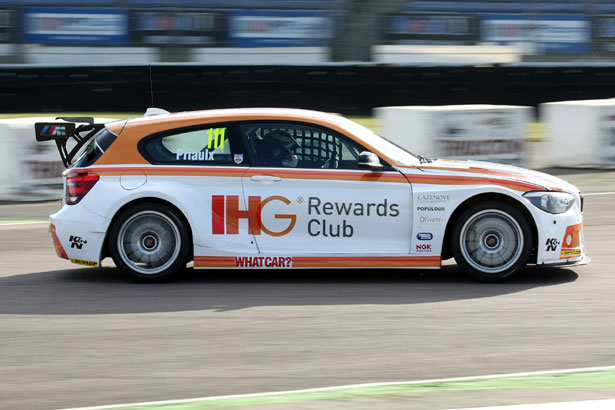 Andy Priaulx driving his IHG Rewards Club liveried BMW 125i M Sport