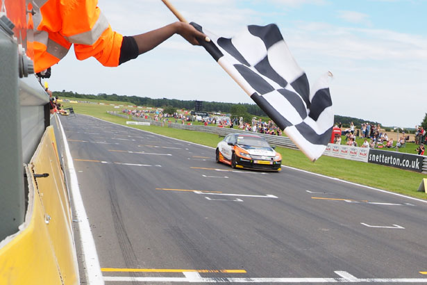 Colin Turkington takes the chequered flag in race two