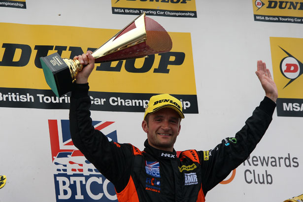 Colin Turkington lifts his 2nd winner's trophy of the day