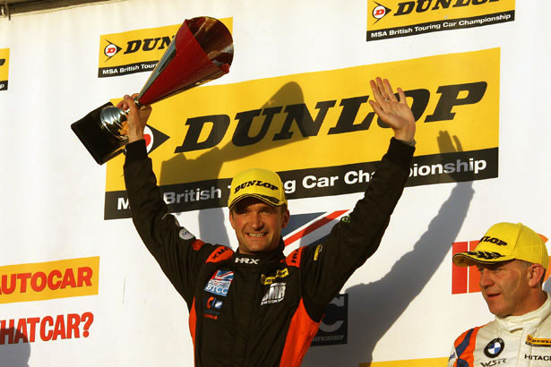 Colin Turkington on the top step of the race 3 podium