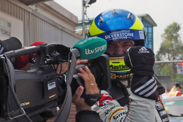 Mat Jackson celebrates his win in the first BTCC race of the day