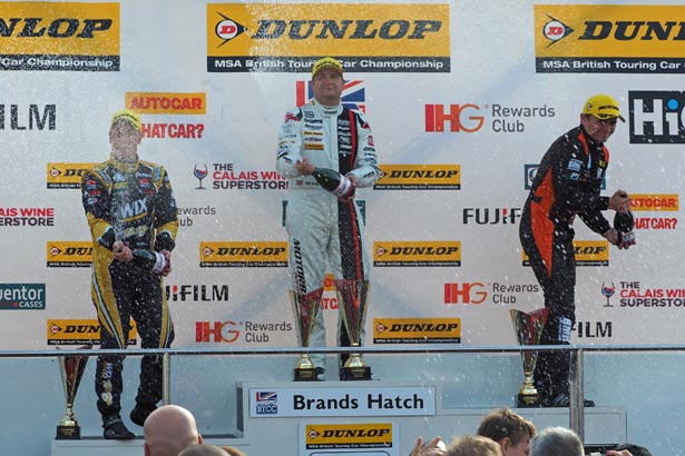 Mat Jackson (centre) on the podium with Aron Smith (right) and Adam Morgan (left)