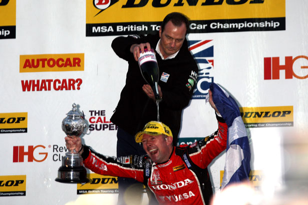 Series Director Alan Gow 'helps' Gordon Shedden celebrate