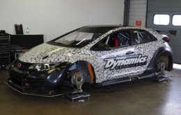 Matt Neal's Honda Yuasa Racing Civic being setup in the garage