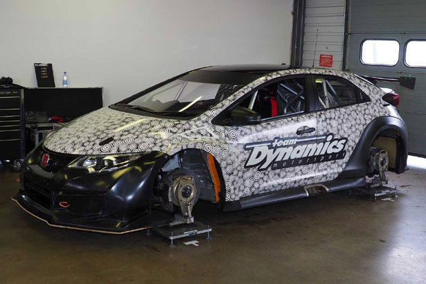 Matt Neal's Honda Yuasa Racing Civic being setup in the garage