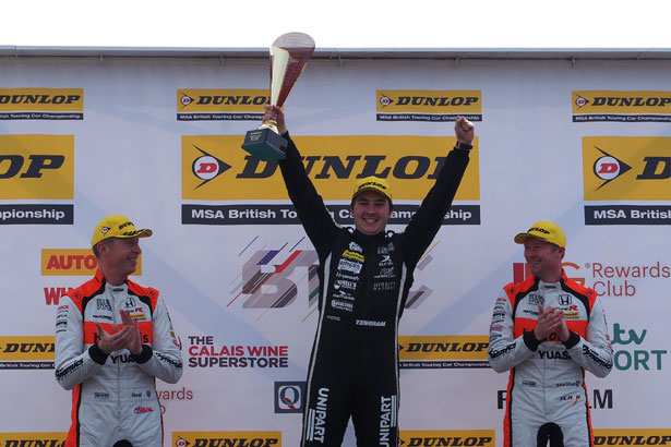 Tom Ingram on the podium with Matt Neal and Gordon Shedden