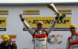 Gordon Shedden on the podium with Matt Neal and Aron Smith