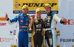 Adam Morgan on the podium with Andrew Jordan and Tom Ingram