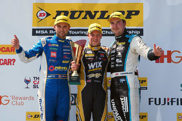 Adam Morgan on the podium with Andrew Jordan and Tom Ingram