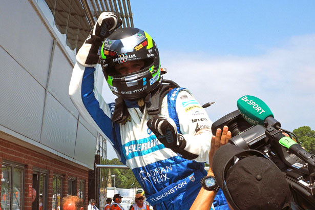 Colin Turkington wins the first race of the day from Oulton Park