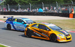 Gordon Shedden defending 3rd place from Jason Plato