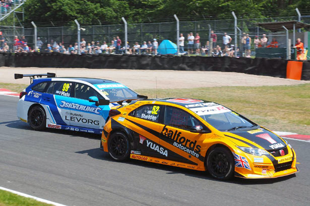 Gordon Shedden defending 3rd place from Jason Plato