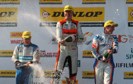 Matt Neal on the podium with Sam Tordoff (right) and Jason Plato (left)