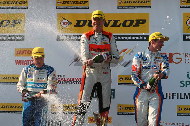 Matt Neal on the podium with Sam Tordoff (right) and Jason Plato (left)