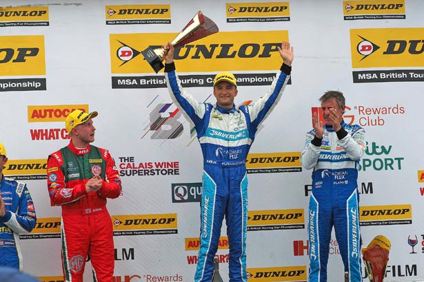 Podium celebrations for Turkington (centre), Plato (right) and Sutton (left)