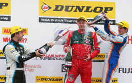 Tom Ingram and Sam Tordoff 'help' Ashley Sutton celebrate his maiden BTCC victory