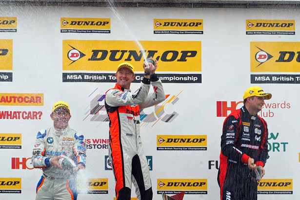 Podium celebrations for Gordon Shedden with Mat Jackson and Rob Collard